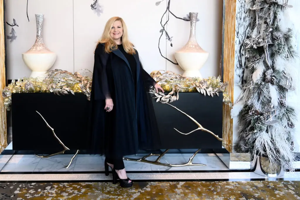 DeeDee Marsh, Trees of Hope Advisory Board Member, wears Oscar de la Renta coat and Yves Saint Laurent shoes from Tootsies. (Photo by Al Torres Photography)