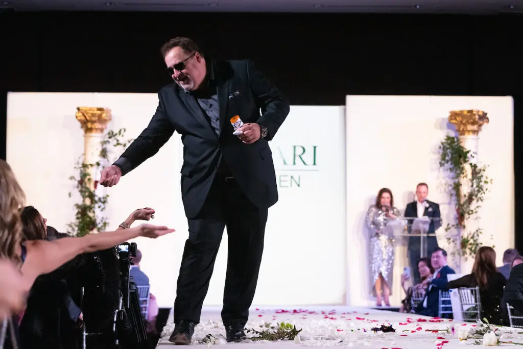 Dr. Matthew Brams walking the runway at Una Notte in Italia (Photo by Daniel Ortiz)