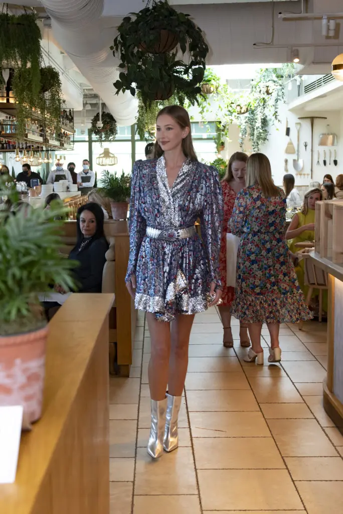 The fashion presentation was commentated by Kimberly Schlegel Whitman and Jan Strimple. (Photo by Tamytha Cameron)