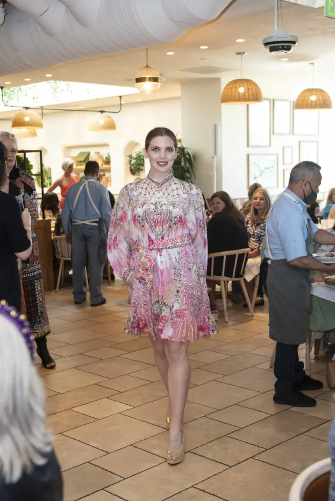 Elegant female and male models walked through the space to show off styles. (Photo by Tamytha Cameron)