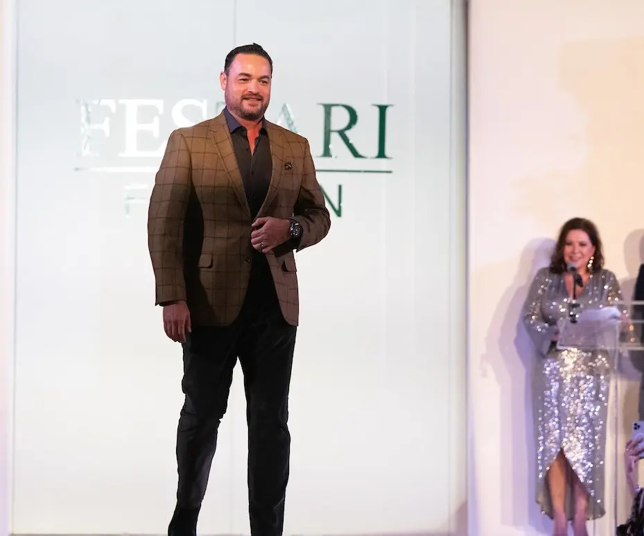 Hugo Guerrero walking the runway at Una Notte in Italia (Photo by Daniel Ortiz)