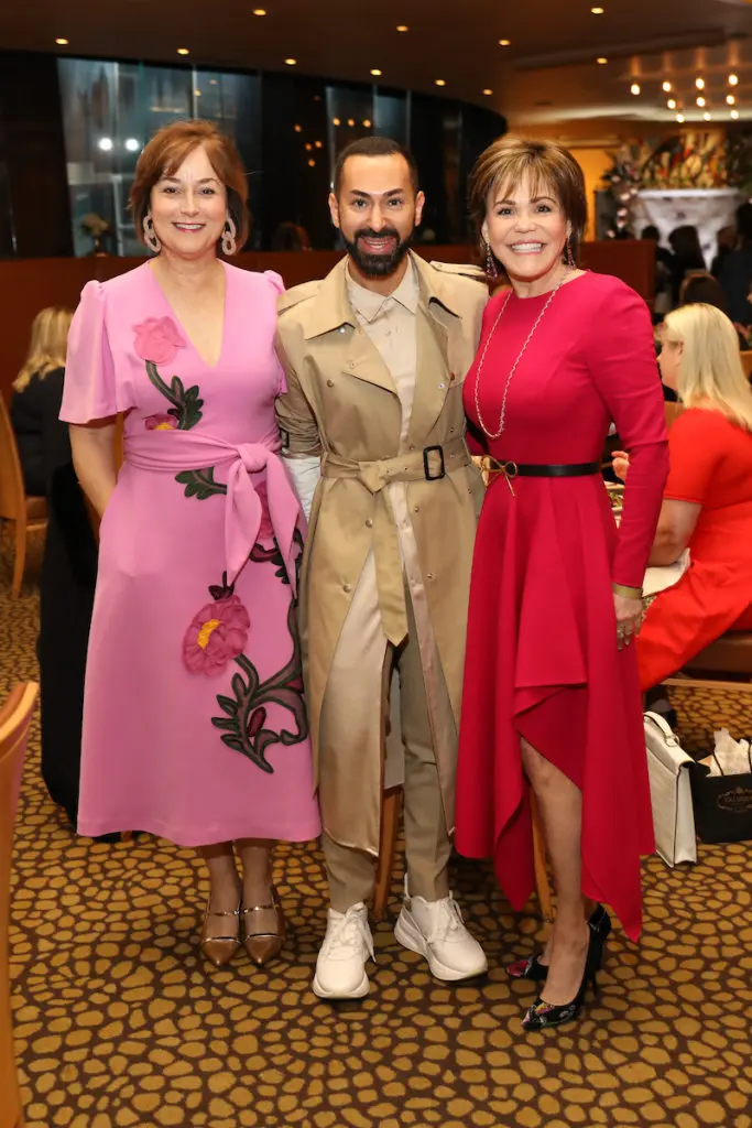 Best Dressed honorees Leigh Smith, left, and Hallie Vanderhider join Fady Armanious at the luncheon held at Tony's. (Photo by Priscilla Dickson)