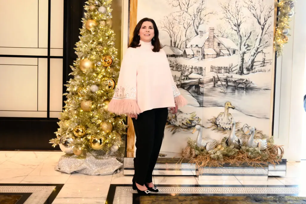 Lesha Elsenbrook, Trees of Hope Advisory Board Member, wears Andrew Gn blouse and Lafayette 148 pants from Tootsies. (Photo by Al Torres Photography)