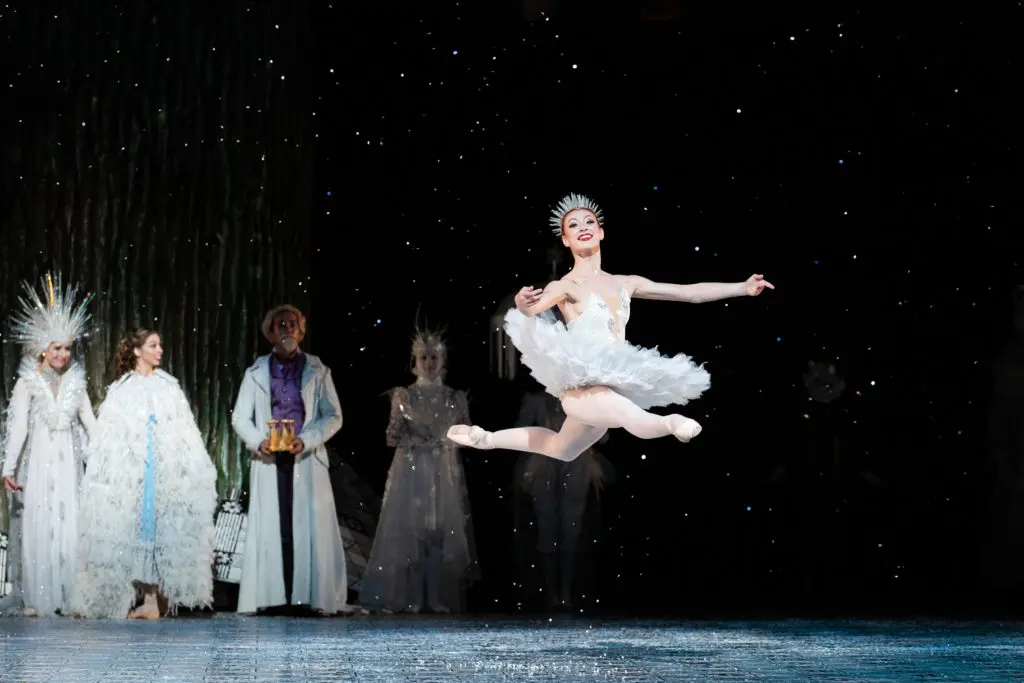 Houston Ballet Soloist Alyssa Springer  with artists of Houston Ballet on opening night 2021 of Stanton Welch’s The Nutcracker. (Photo by Lawrence Elizabeth Knox,  Courtesy of Houston Ballet)

