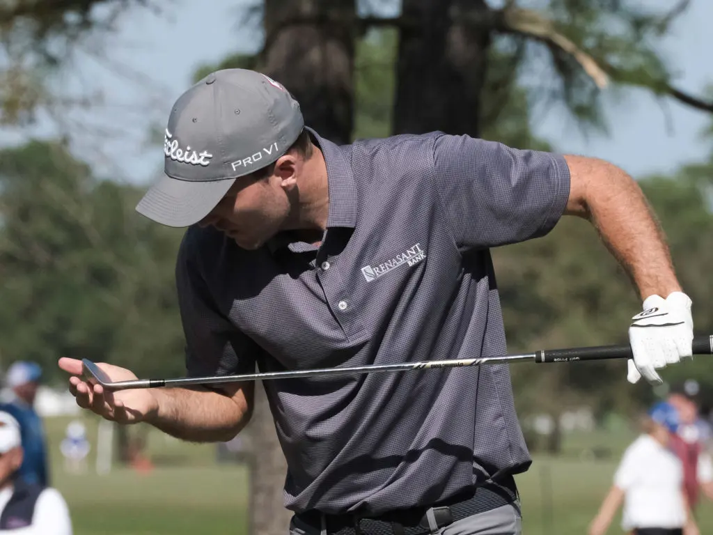 Russell Henley knows you have to be sure of your club. (Photo by F. Carter Smith)
