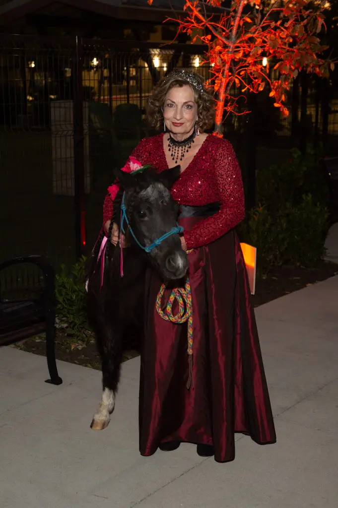 Houston SPCA President and CEO Patti Mercer  and a rescue pony (Photo by Wilson Parish)
