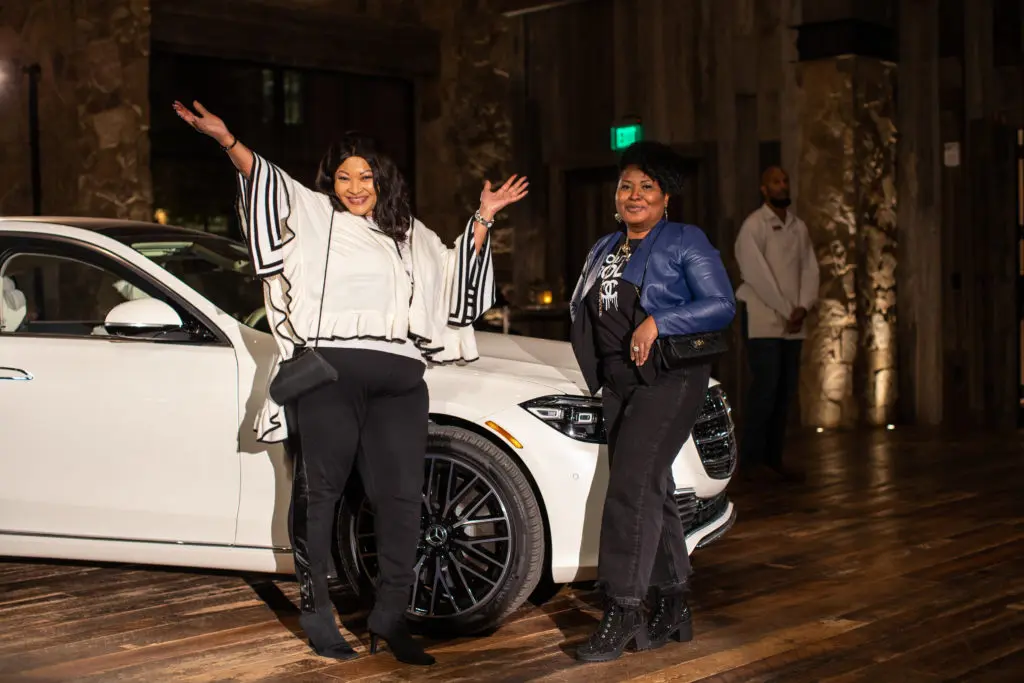 Who could resist a selfie with the guest of honor S-Class Sedan? Photos by Ashley Gongora .