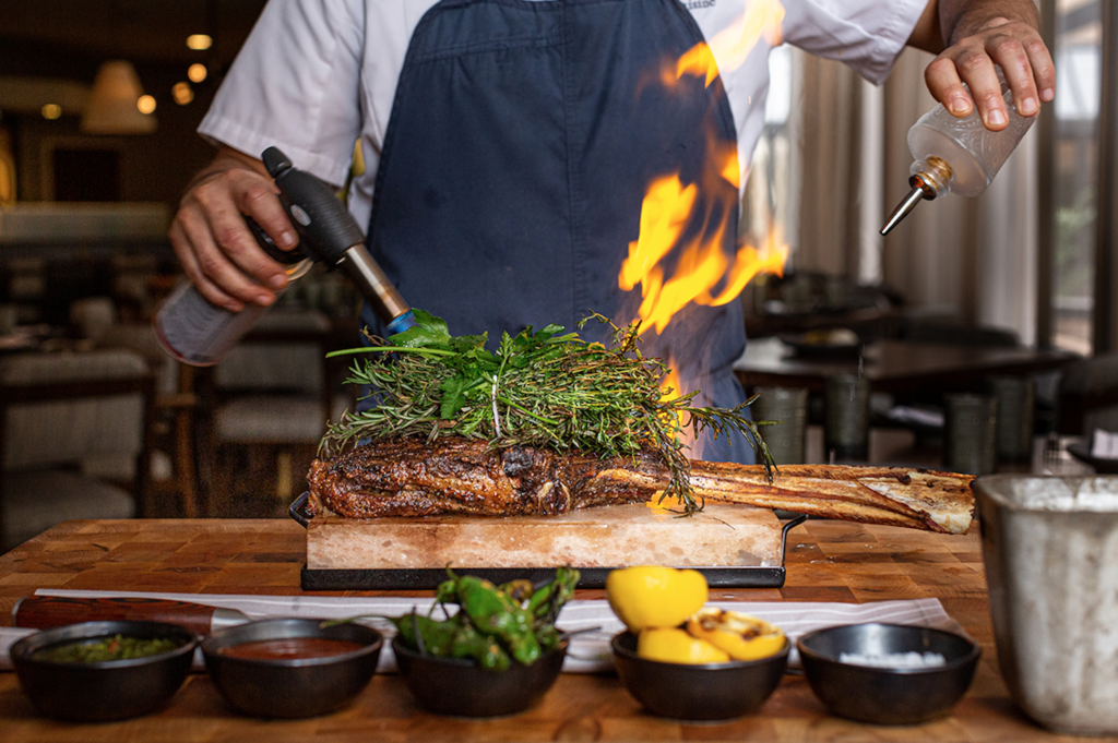 Guests at the Toro Toro opening party at Four Seasons Hotel Houston were treated to samples of the famed 52-ounce bone-in ribeye. (Photo by Jenn Duncan)