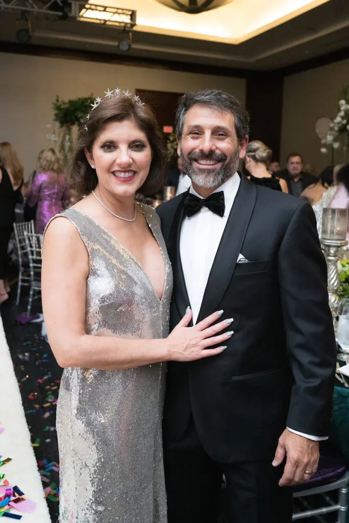 Stacey & Al Lindseth, sporting a tuxedo from Festari for Men modeled during the Una Notte in Italia fashion benefit (Photo by Daniel Ortiz)