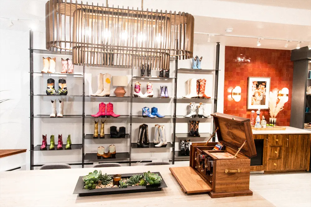 The "magic box," where customers can monogram and customize their boots, finds a home in the center of the Aspen store.  (Photo by Tyler Wilkinson-Ray)