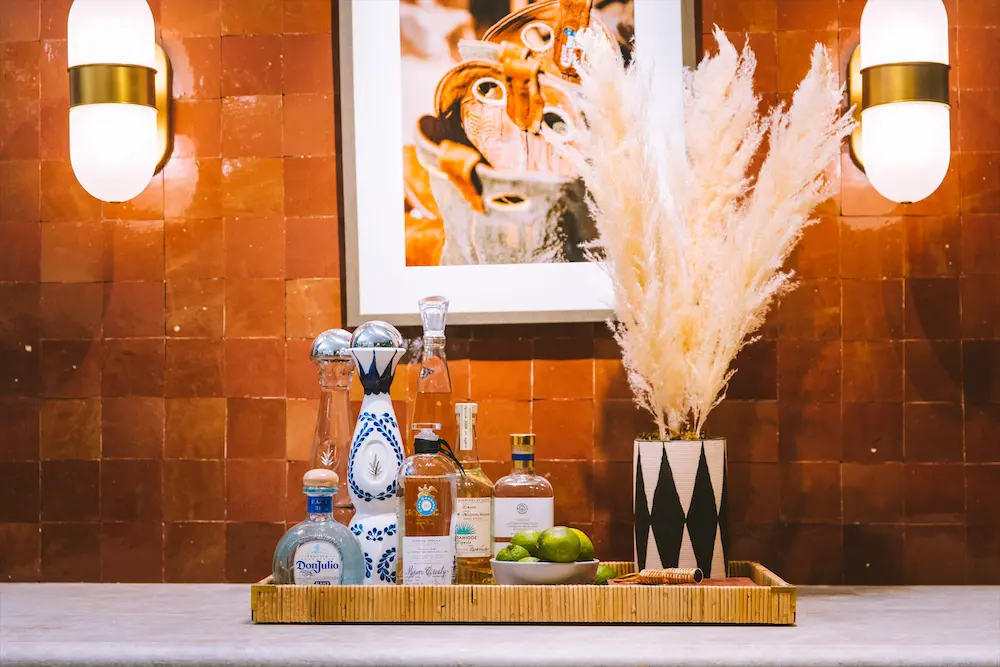 Casa Dragones and Lalo tequila sits at the ready for a signature Miron Crosby ranch water.  (Photo by Tyler Wilkinson-Ray)