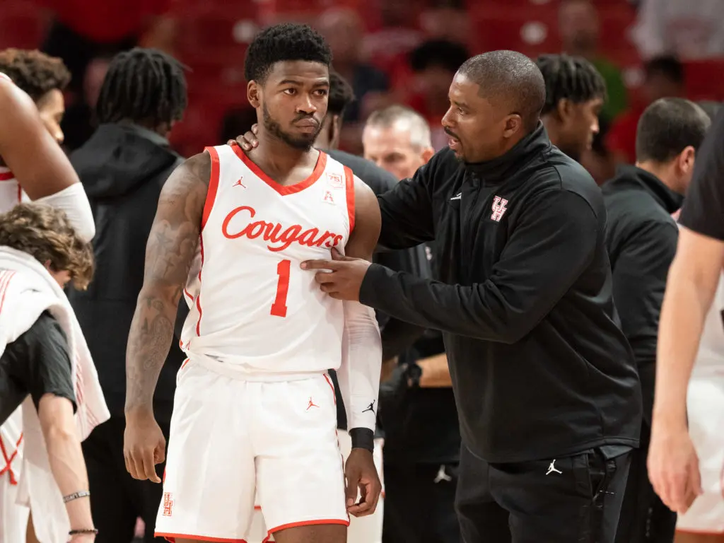 Jamal Shead and UH assistant coach Quannas White are always working on the guard's game. And mindset.. (Photo by F. Carter Smith)