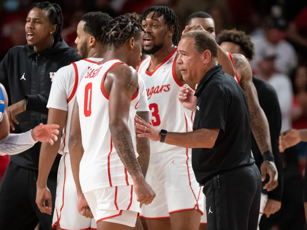 Kelvin Sampson may have talked to Marcus Sasser more than any other player during most games he played. That's how crucial Sasser is. (Photo by F. Carter Smith)