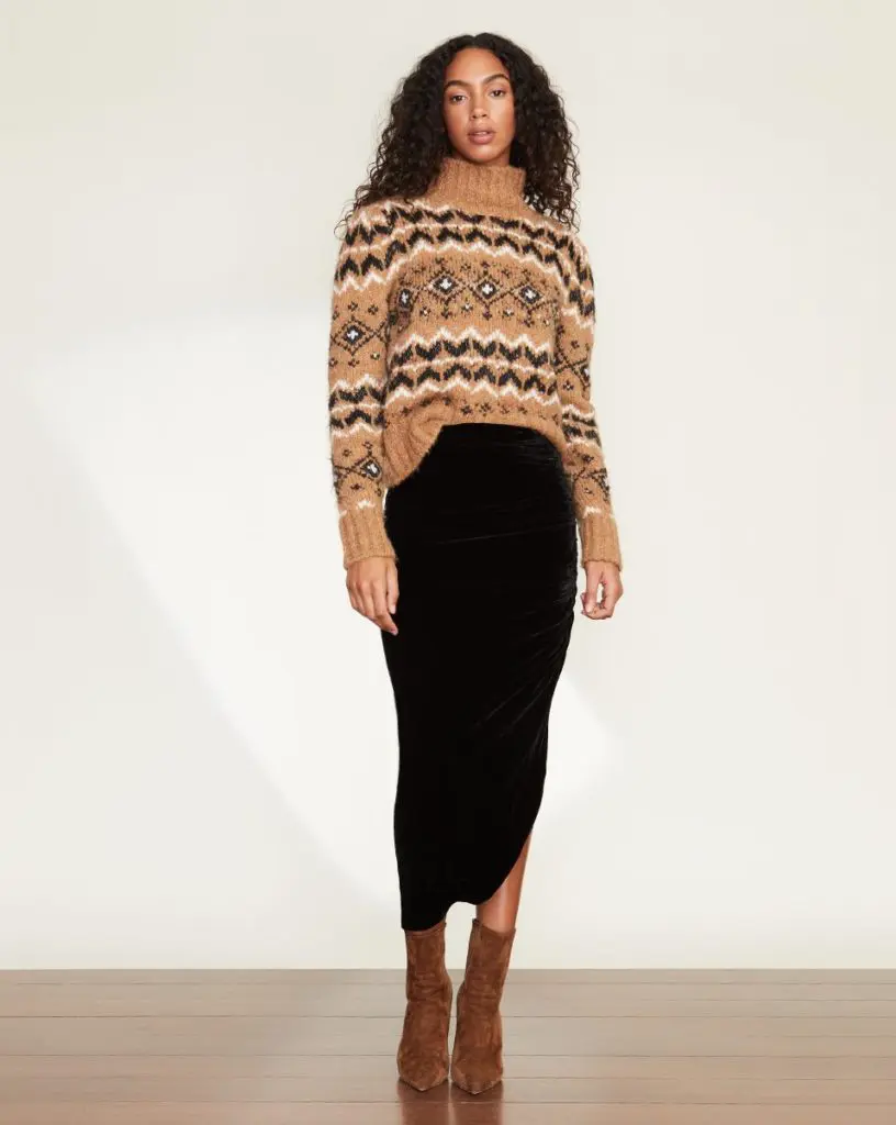 The beautiful Veronica Beard Chiana Fair Isle sweater and Herst black velvet midi skirt pair so well together. ($495)