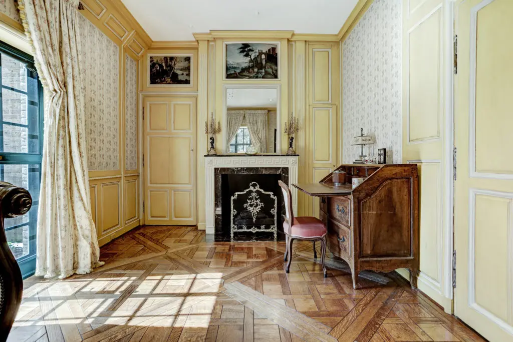 The corner of an intimate bedroom that could double for other uses. (Photo by TK Images)