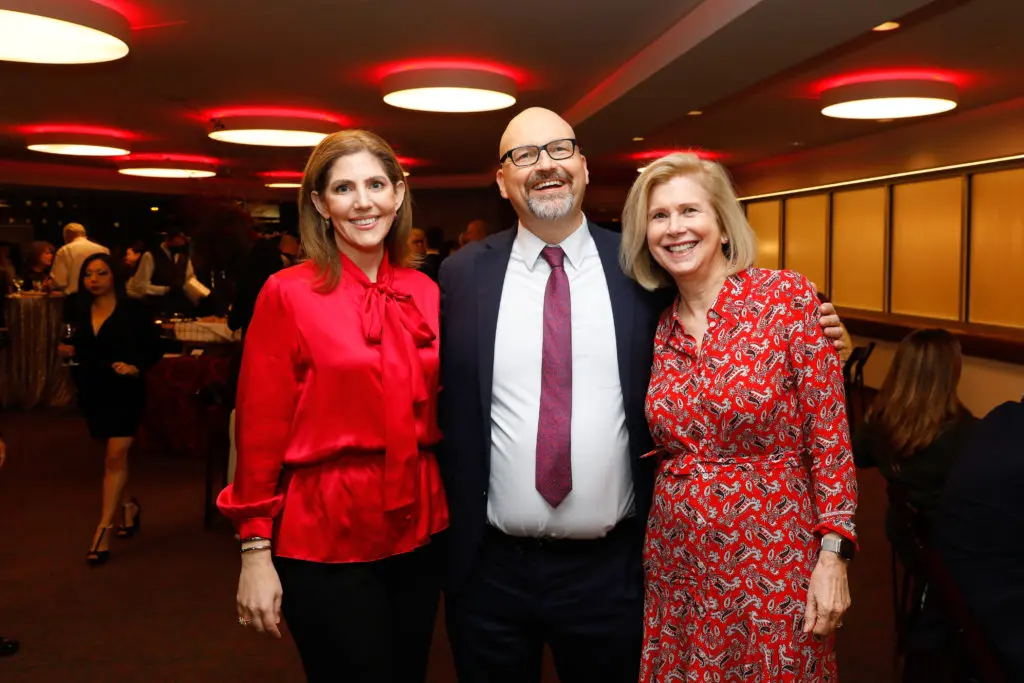 Event co-chairs Rose Hochner Nelson and Eloise Brice with Rob Melrose at the Alley Theatre 'Deck the Trees' evening (Photo by Priscilla Dickson)