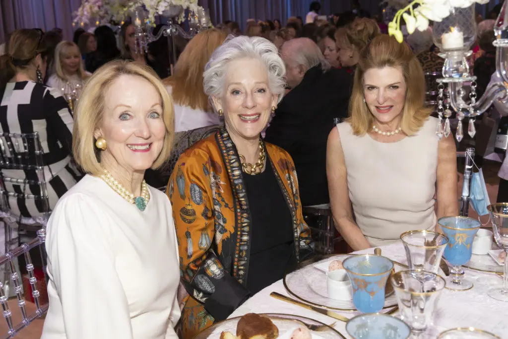 Barbie Clemons, Cynthia Siegel, and Susie Green at the Texas Ballet Theater Caren Koslow Fashion Show and Luncheon at Bass Hall in Fort Worth, Texas on December 9, 2021. (Photo by/Sharon Ellman)