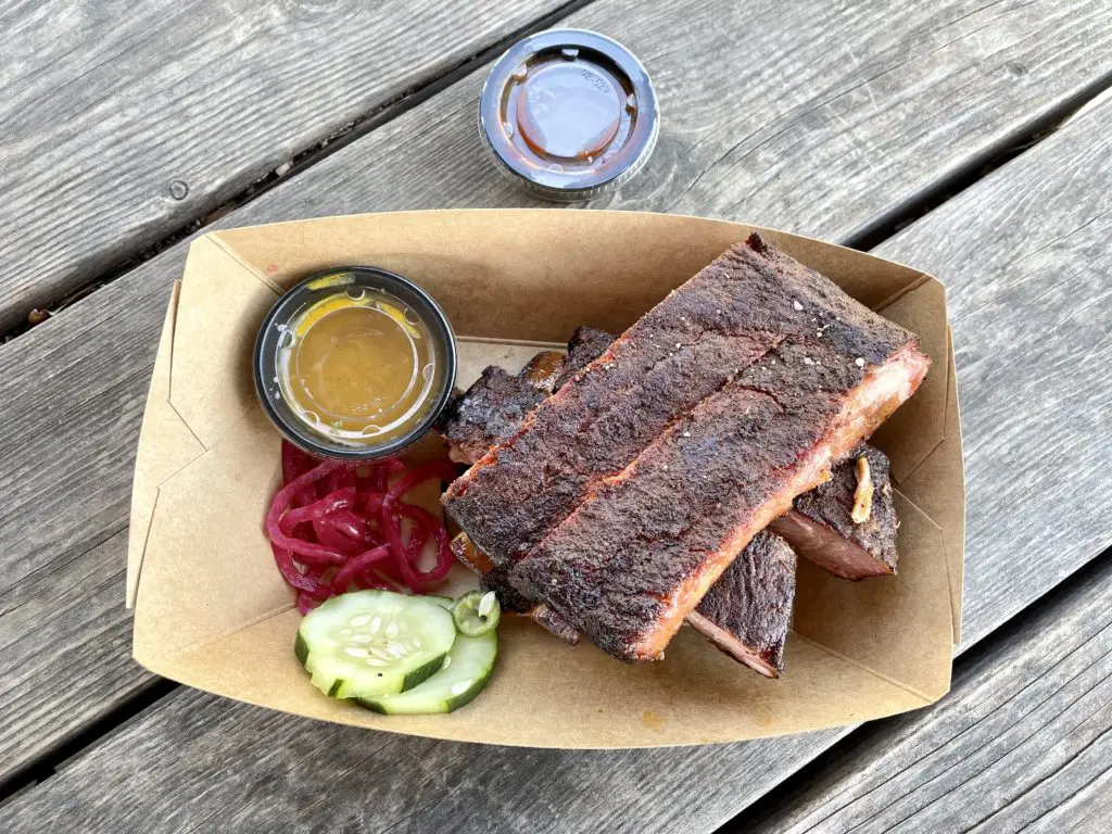 St. Louis style pork ribs with two sauces at F1 Smokehouse. (Photo by Courtney Dabney)