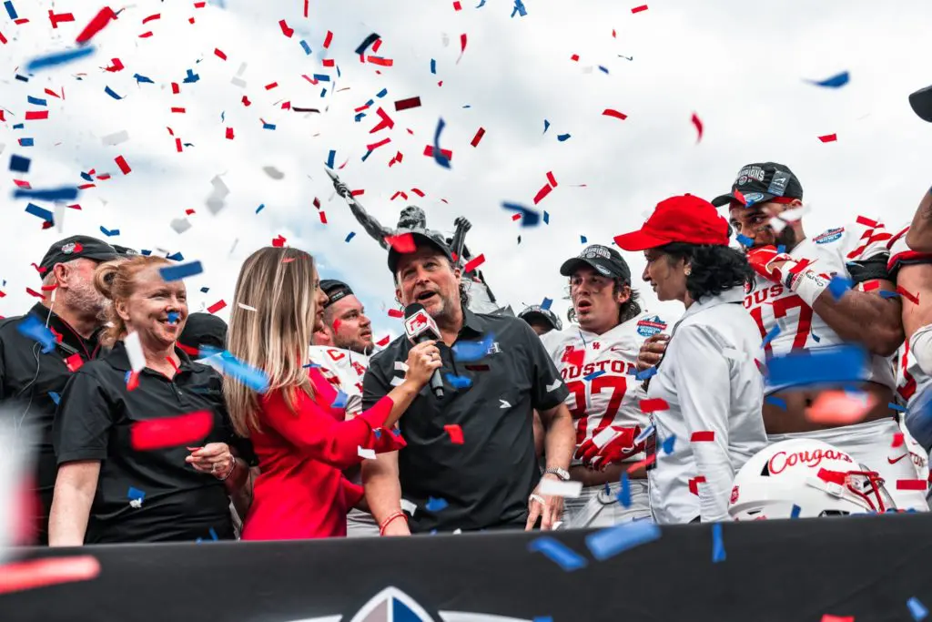 Dana Holgorsen and his UH football players enjoyed a confetti party after the Birmingham Bowl win. (@UHCougarFB)