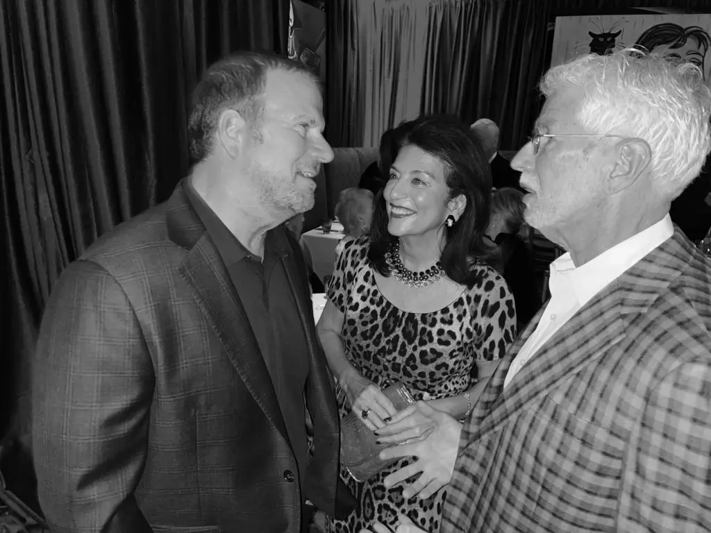 Billionaire owner of the Post Oak Hotel greets Dancie Ware and Dr. Jim Muntz during the cocktail reception before dinner at Café Post Oak. (Photo by Shelby Hodge)