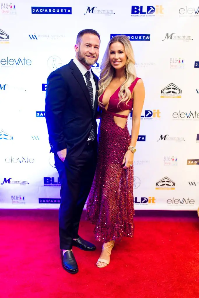Joshua & Trisha Weisman at Construction Concepts' holiday party for a cause (Photo by Hung L. Truong Photography)
