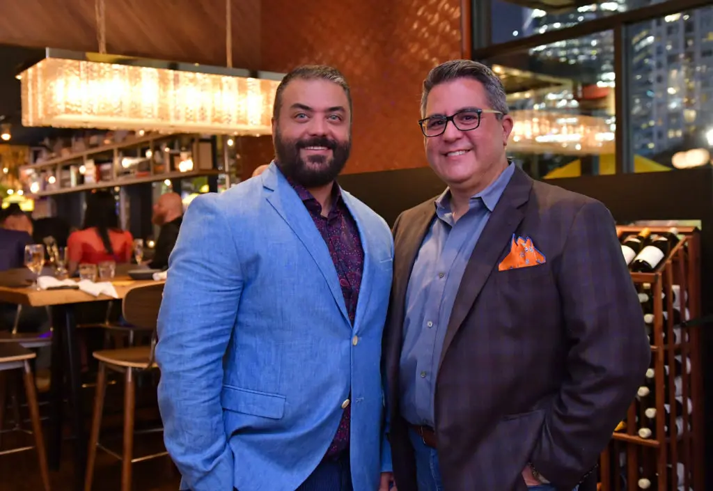 Kayvon Sohrabi, Dr. Roland Maldonado at the opening of Postino in Uptown Park (Photo by Alex Montoya)