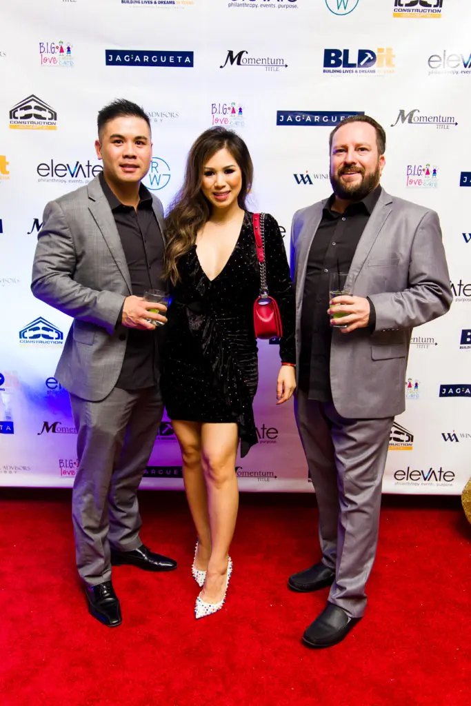 Kevin Nguyen, Vivian Pham, Andres Gutierrez at Construction Concepts' holiday party for a cause (Photo by Hung L. Truong Photography)