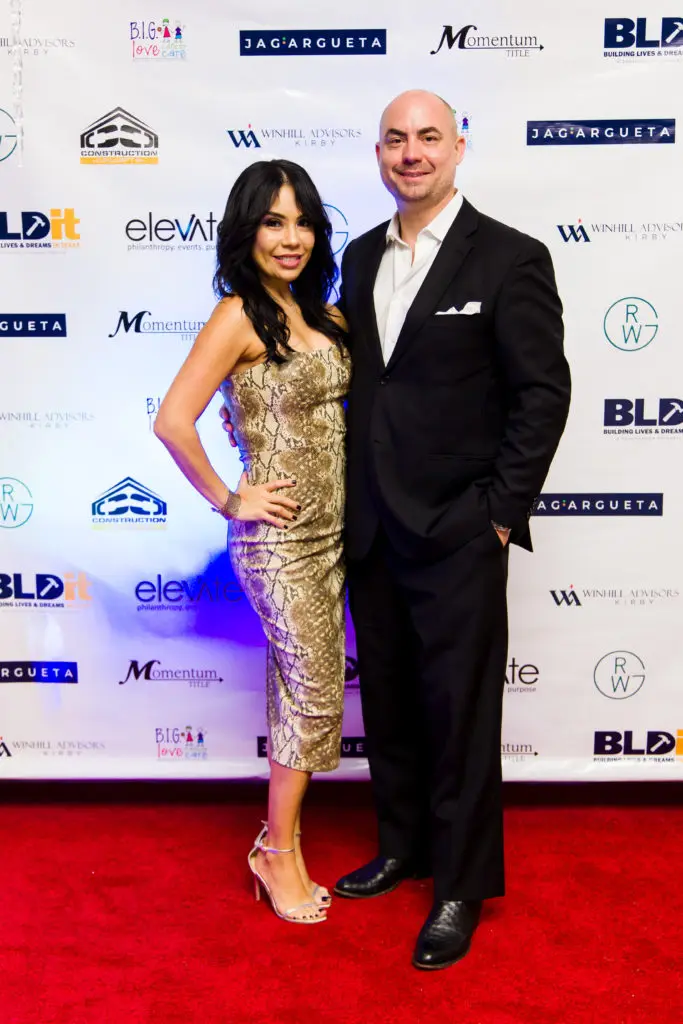 Vanessa & Charlie Kriegel at Construction Concepts' holiday party for a cause (Photo by Hung L. Truong Photography)