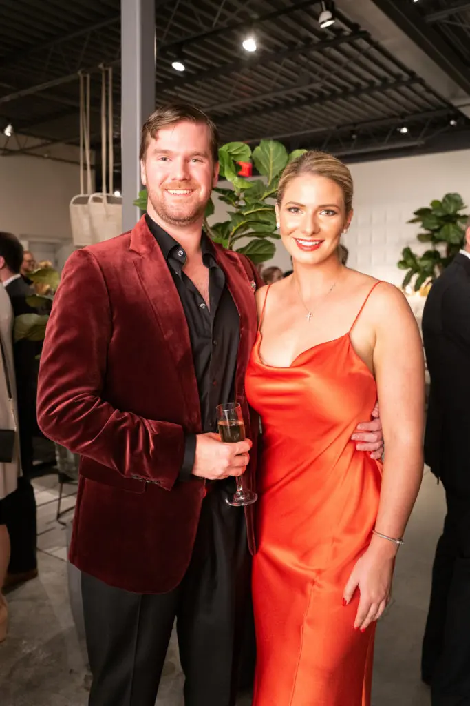 Eric Brueggeman, Lanie Markham at the Young Associates Council holiday party at BeDESIGN.  (Photo by Daniel Ortiz)