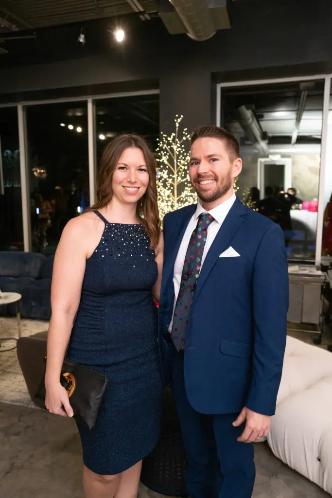 Stephanie Weber, Paul Muri at the Houston Symphony Young Associates Council holiday party at BeDESIGN. (Photo by Daniel Ortiz)