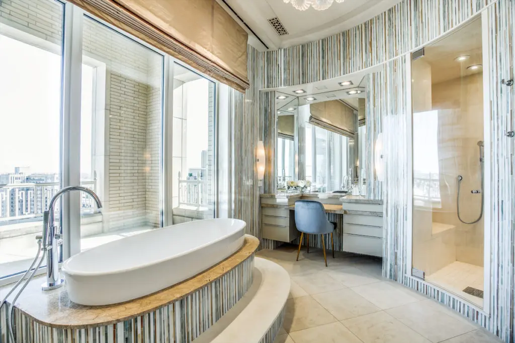 The master bathroom could rival any high-end spa. (Photo by Shoot2Sell for Douglas Elliman)