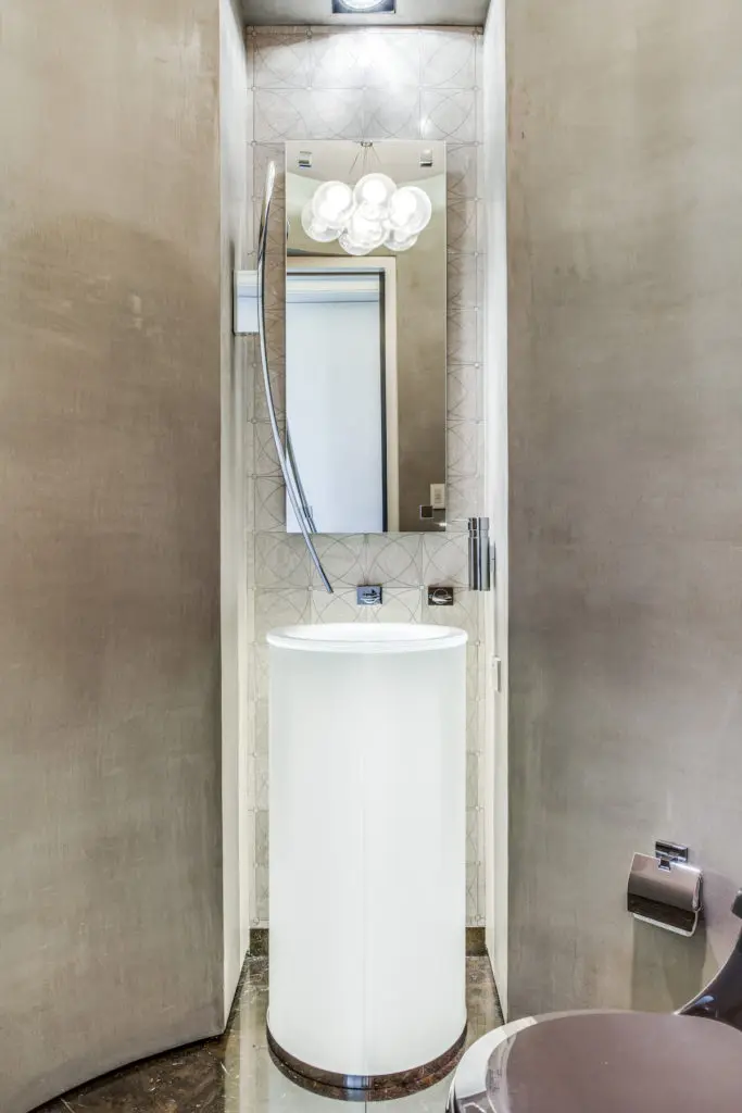 A pretty half-bathroom is an escape all on its own. (Photo by Shoot2Sell for Douglas Elliman)