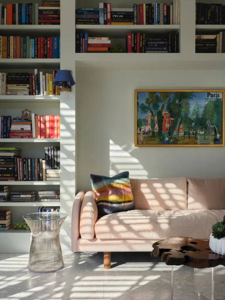 The sitting room sofa is by Lawson-Fenning, covered in Perennials Plushy fabric. Warren Platner side table. Lawson-Fenning coffee table. (Photo by Lisa Petrole)