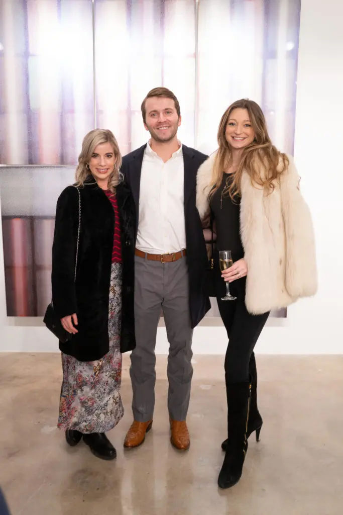 Chrissy Looke, Russell Frank, Addy Purdy at the opening of artist Christopher Martin's gallery in the Upper Kirby District's Gallery Row in Houston. (Photo by Daniel Ortiz)