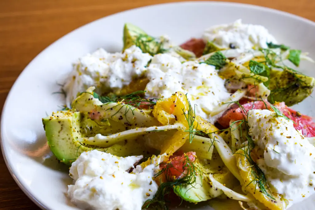 Daily Gather in CityCentre features various creative dishes such as the citrus avocado salad. (Photo by Sabrina Miskelly)