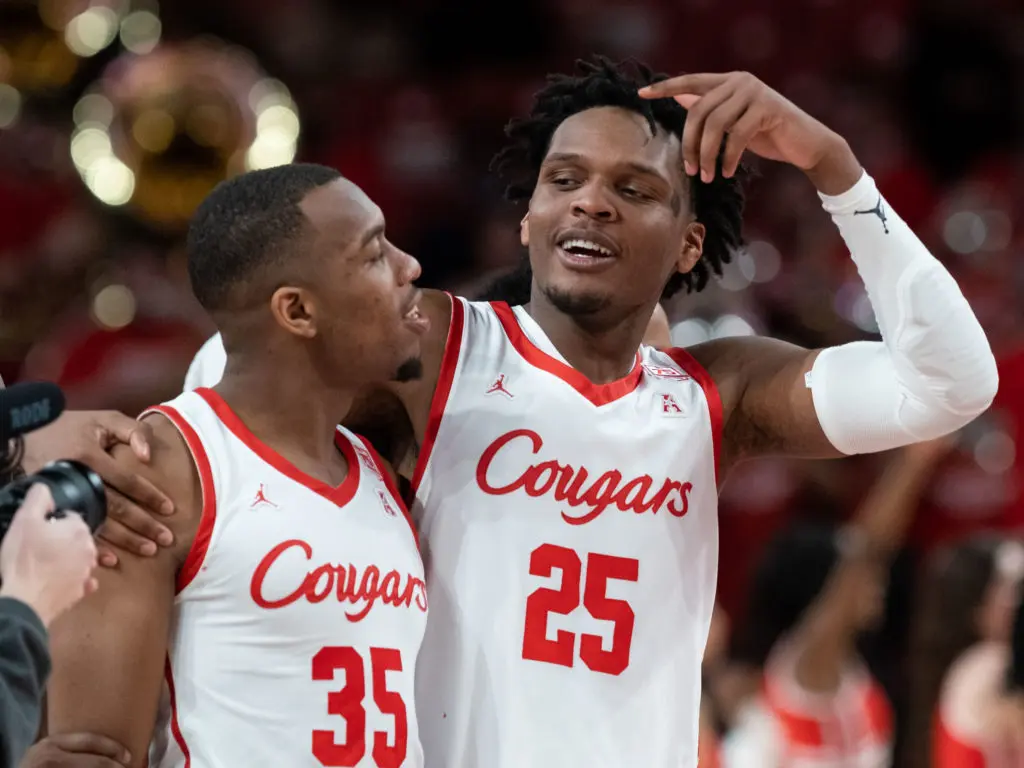 Just two big guys having fun. Fabian White Jr. and Josh Carlton are huge parts of this unexpected Houston surge. (Photo by F. Carter Smith)