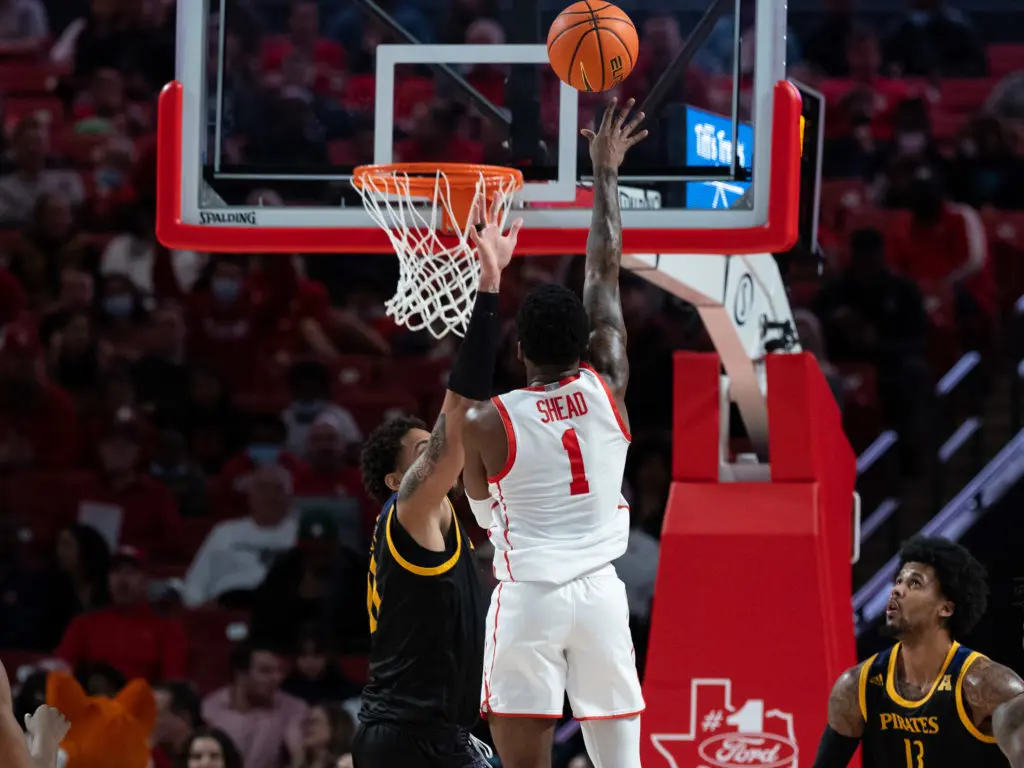 Jamal Shead uses little runners and floaters in the lane to great effect for Houston. (Photo by F. Carter Smith)