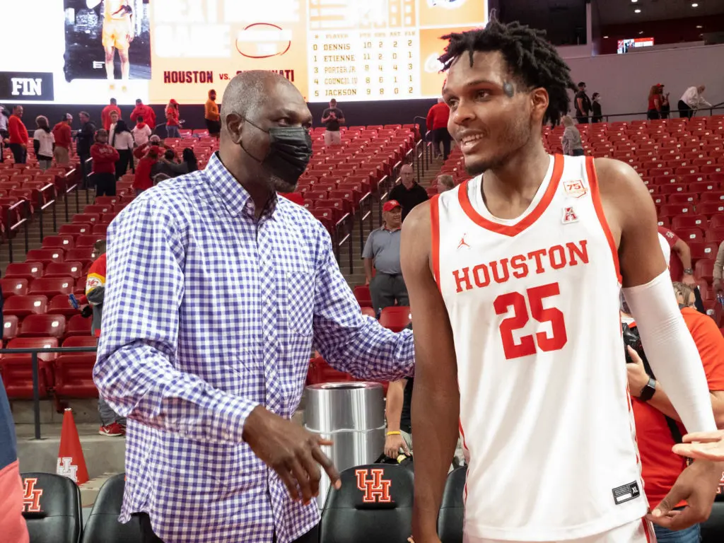 Hakeem Olajuwon made sure to talk to University of Houston big man Josh Carlton after this game day visit. (Photo by F. Carter Smith)