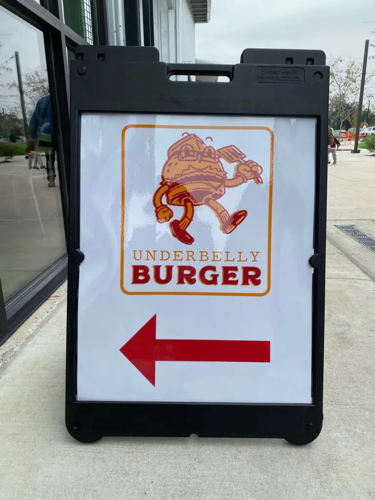 Look for this sign to Underbelly Burger at the back of Houston Farmers Market in the left flank as you face the entrance. (Photo by Shelby Hodge)