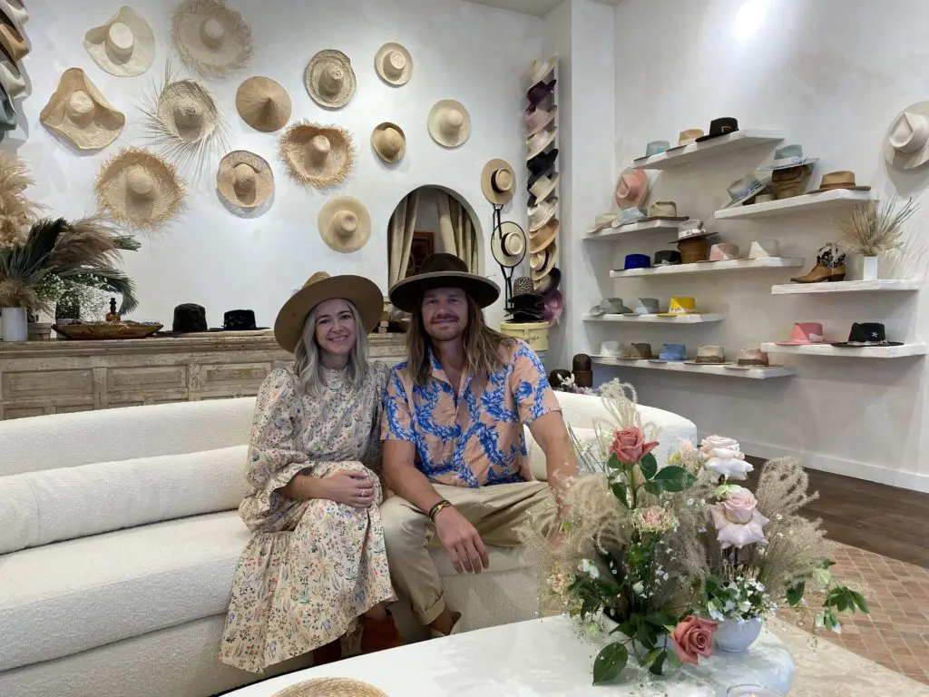 Contemporary milliner Teressa Foglia with Tyler Hays Wild, her creative director, business partner and boyfriend,  in her namesake boutique in Houston's River Oaks District. (Photo by Shelby Hodge)