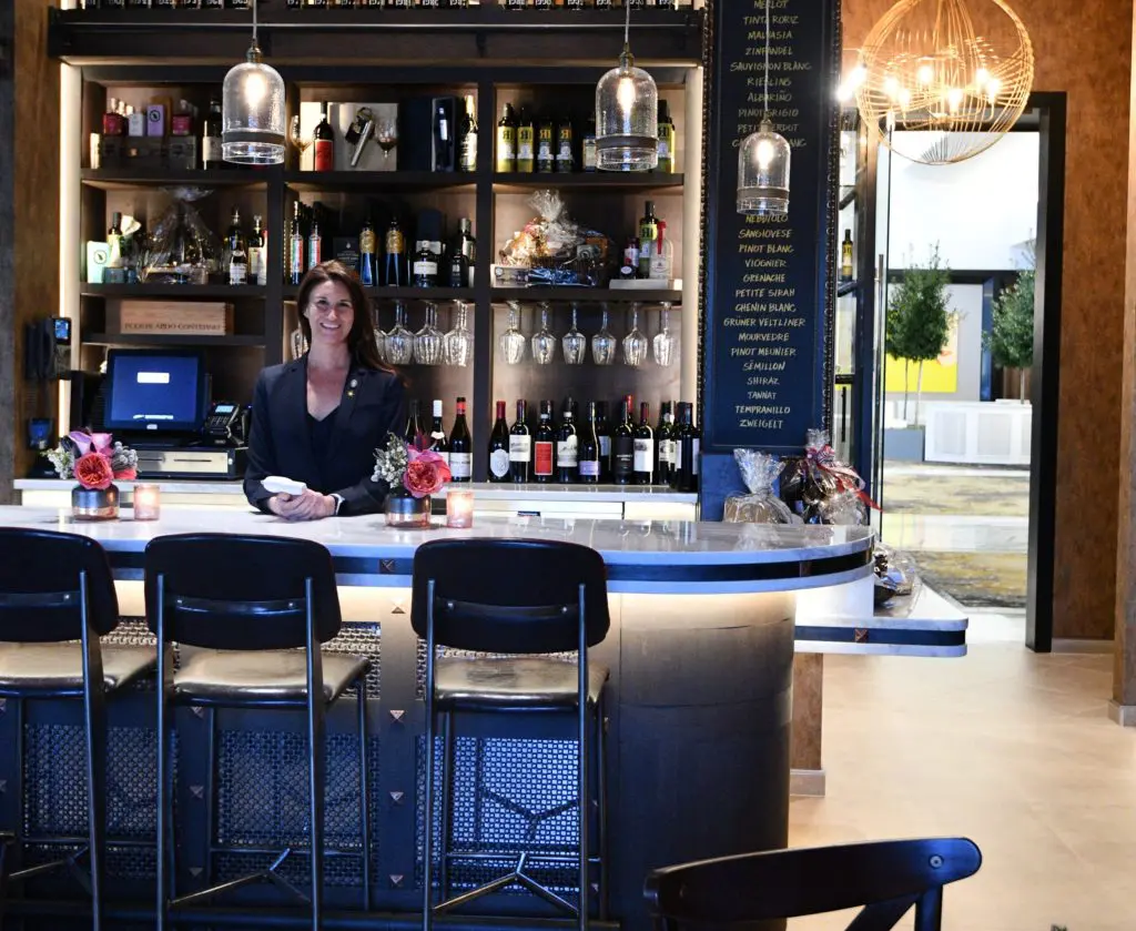 Julie Dalton fills the role of wine director at Stella's Wine Bar, the latest addition to billionaire Tilman Fertitta's Post Oak Hotel.