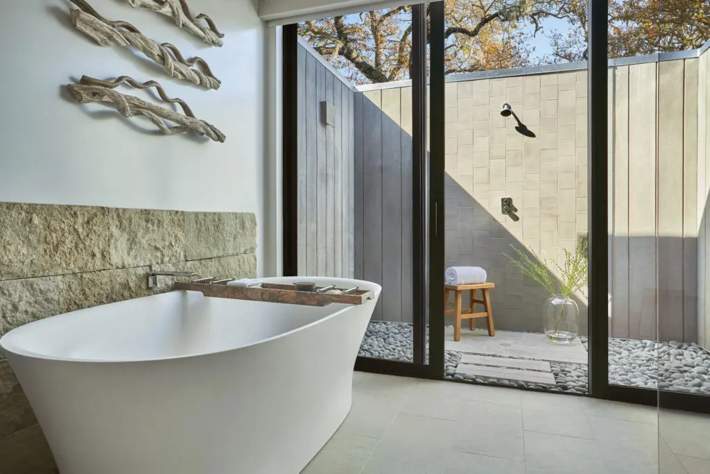 Soaking tubs and outdoor showers take each Montage Healdsburg room to the next level.  (Photo by Christian Horan)