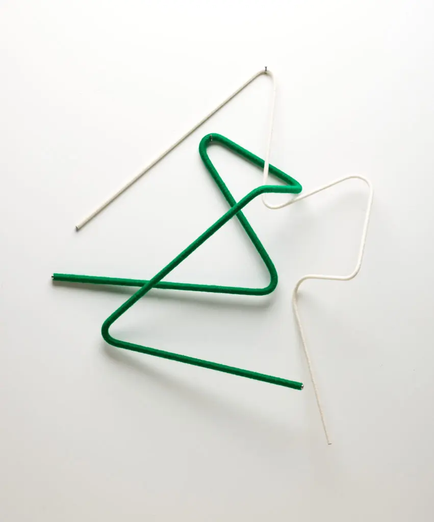 Catherine MacMahon's "emptiness looms Between Blades of Grass," 2021, demonstrates her commitment to minimalism.