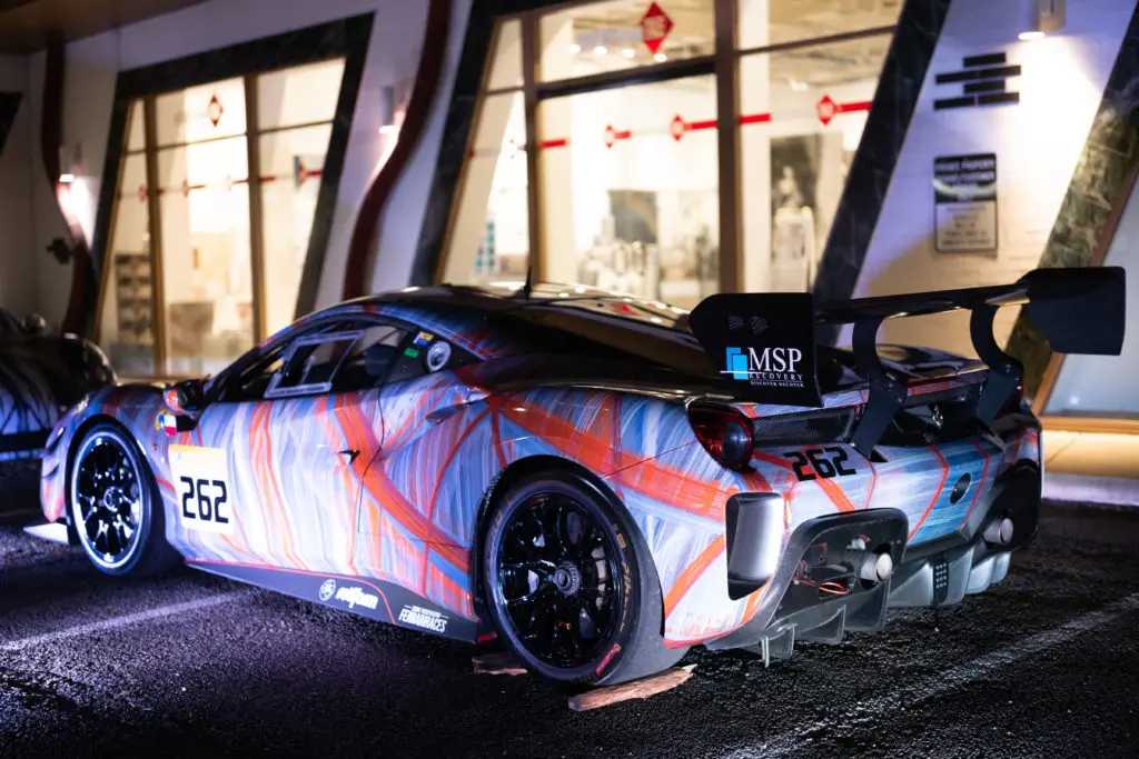 ONe of two Ferarri's wrapped in artist Christopher Martin's work welcoming guests to the opening of his namesake gallery in Upper Kirby District's Gallery Row. (Photo by Daniel Ortiz)
