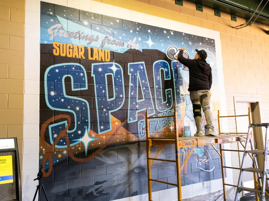 Houston artist Jesse de Leon painted the Space Cowboys new mural. (Photo by F. Carter Smith)
