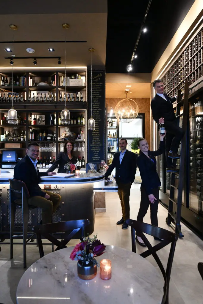 The team at Stella's Wine Bar in The Post Oak Hotel is ready to give guests a pour or a bottle from the hotel's cache of 30,000 bottles.