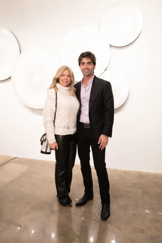 Stephanie Perkins & Andrea Chiapuzzo at the opening of artist Christopher Martin's gallery in the Upper Kirby District's Gallery Row in Houston. (Photo by Daniel Ortiz)
