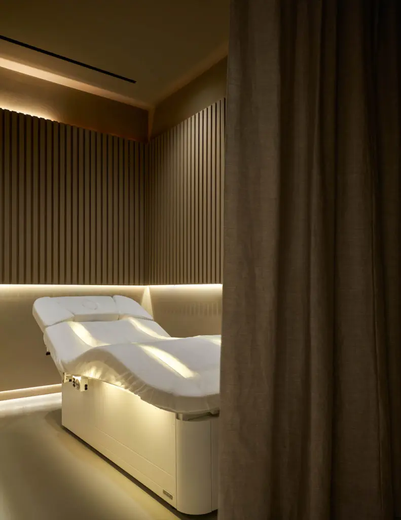 A view into one of the Dallas spa's high-tech treatment rooms, featuring Sturm's anti-inflammatory spa wave bed.  (Photo by Nathan Schroder)