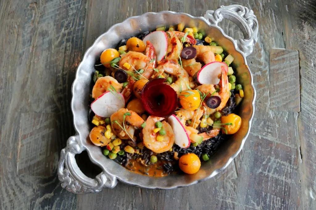 Caracol's arroz negro con mariscos available on the restaurant's special Valentine's Day menu. (Photo by Paula Murphy)