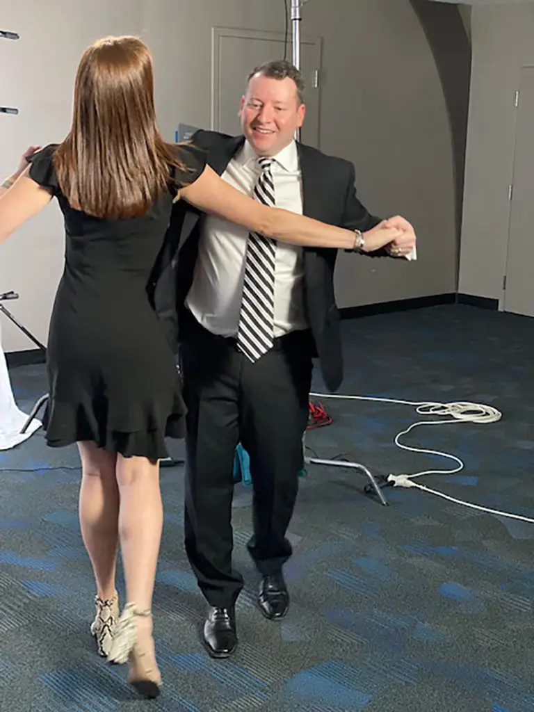 Gala co-chairs enjoy an impromptu dance to 'Fly Me to the Moon' during taping of the virtual gala video by Lorrelle Media.
